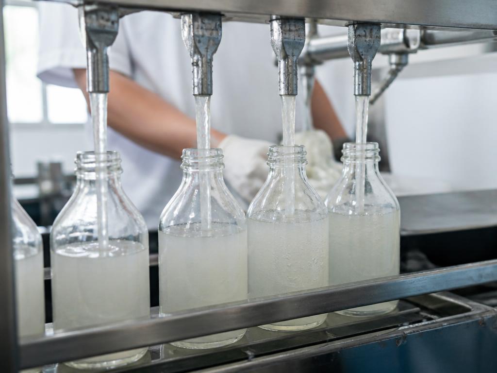 Concentrated coconut water being filled into 65mL shot bottles